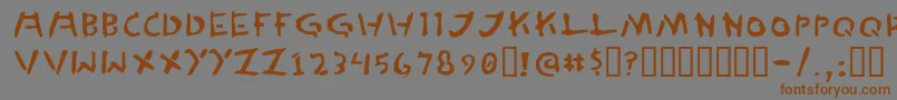 フォントTedCannon – 茶色の文字が灰色の背景にあります。