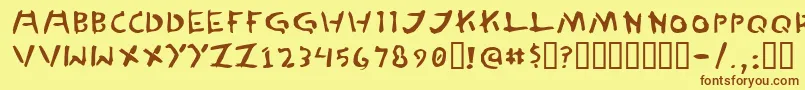 フォントTedCannon – 茶色の文字が黄色の背景にあります。