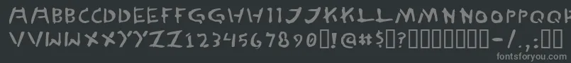 フォントTedCannon – 黒い背景に灰色の文字