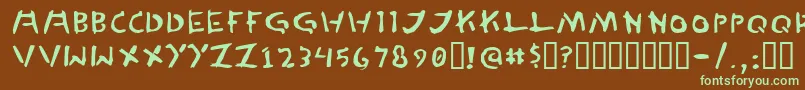 フォントTedCannon – 緑色の文字が茶色の背景にあります。