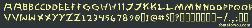 フォントTedCannon – 黒い背景に黄色の文字