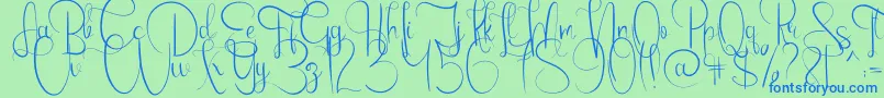 Emanuela-Schriftart – Blaue Schriften auf grünem Hintergrund