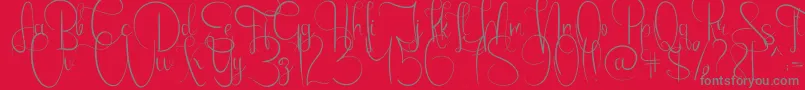 Emanuela-Schriftart – Graue Schriften auf rotem Hintergrund