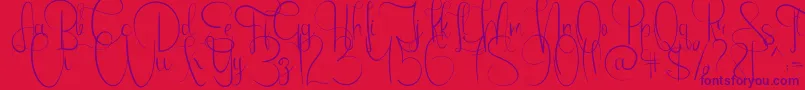 Emanuela Font – Purple Fonts on Red Background