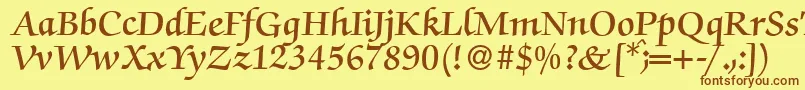 フォントZabriskiescriptDemiRegular – 茶色の文字が黄色の背景にあります。
