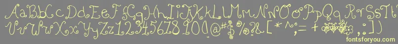 Bizzy Font – Yellow Fonts on Gray Background