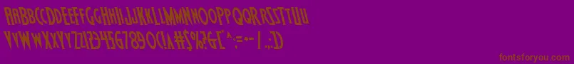 フォントWolfsbane2left – 紫色の背景に茶色のフォント