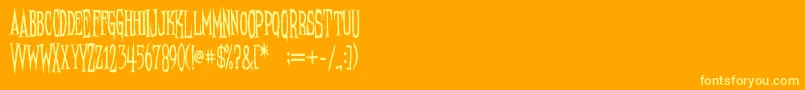 NeedleteethPsycho-fontti – keltaiset fontit oranssilla taustalla