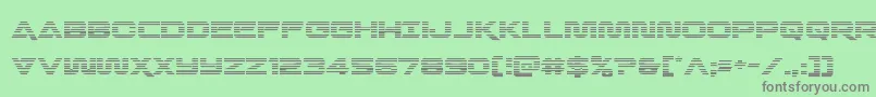 Quarkstormgrad-fontti – harmaat kirjasimet vihreällä taustalla