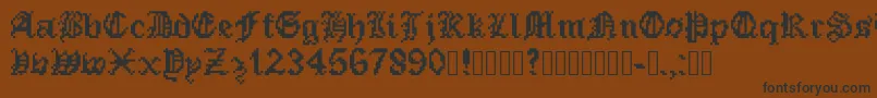 PixeledEnglishFont-fontti – mustat fontit ruskealla taustalla