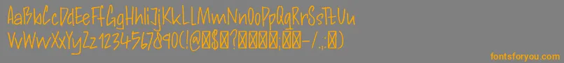 DkAndorraScript-fontti – oranssit fontit harmaalla taustalla