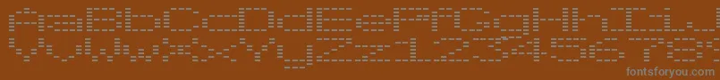 フォントOtoTanpa – 茶色の背景に灰色の文字