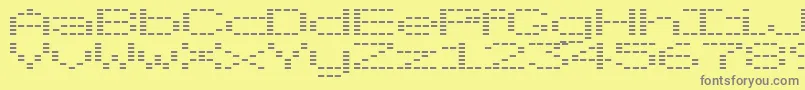 フォントOtoTanpa – 黄色の背景に灰色の文字