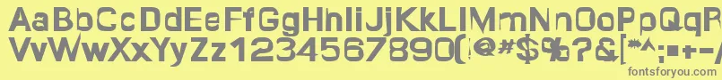 フォントQuropa ffy – 黄色の背景に灰色の文字