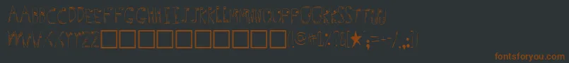Germs-Schriftart – Braune Schriften auf schwarzem Hintergrund