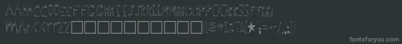Germs-Schriftart – Graue Schriften auf schwarzem Hintergrund