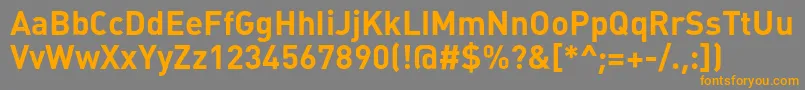 フォントPlumbboldc – オレンジの文字は灰色の背景にあります。