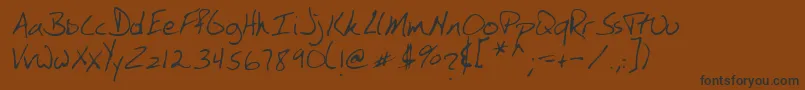 SimkinsRegular Font – Black Fonts on Brown Background