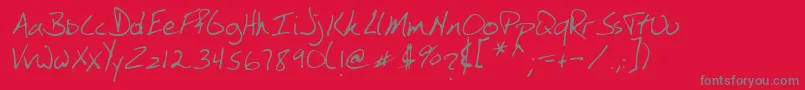 SimkinsRegular-Schriftart – Graue Schriften auf rotem Hintergrund