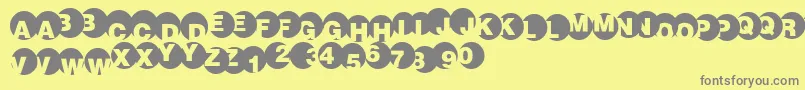 Spotlights Font – Gray Fonts on Yellow Background