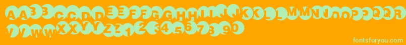 Spotlights Font – Green Fonts on Orange Background