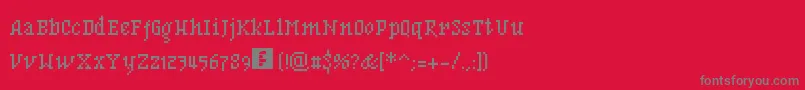 フォントBfMnemonikaRegular – 赤い背景に灰色の文字