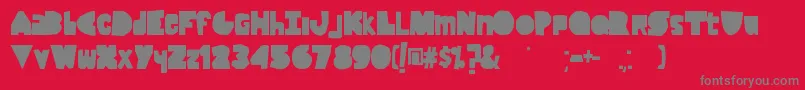 Fonte LackOfLuck – fontes cinzas em um fundo vermelho