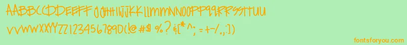 フォントExpensivehabits – オレンジの文字が緑の背景にあります。