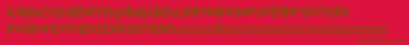 Dottricks Font – Brown Fonts on Red Background