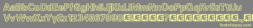 JaggedBrk Font – Yellow Fonts on Gray Background