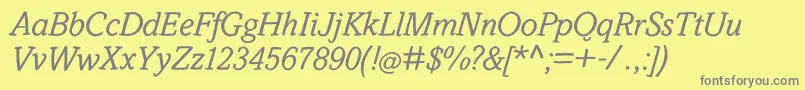 SlabstickOblique-fontti – harmaat kirjasimet keltaisella taustalla