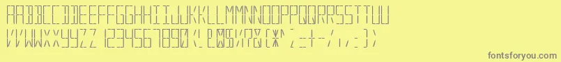 フォントDigitalSystem – 黄色の背景に灰色の文字