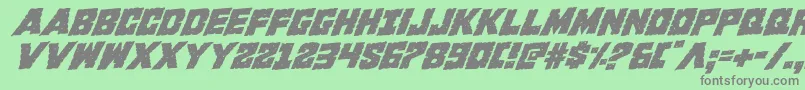 Kcommandorotal-fontti – harmaat kirjasimet vihreällä taustalla
