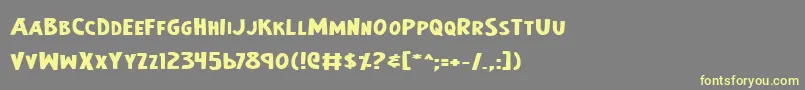 EarthsMightiestBoldExpanded Font – Yellow Fonts on Gray Background