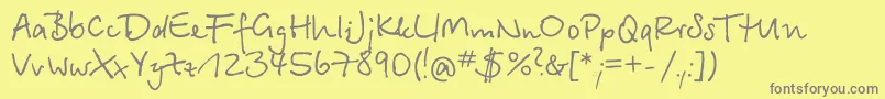 フォントBts35C – 黄色の背景に灰色の文字