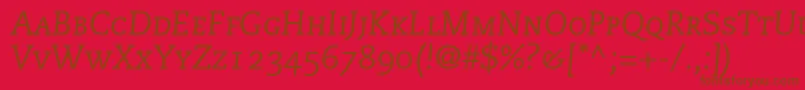 フォントMonologueCapsSsiItalicSmallCaps – 赤い背景に茶色の文字