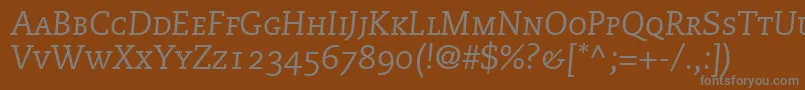 フォントMonologueCapsSsiItalicSmallCaps – 茶色の背景に灰色の文字