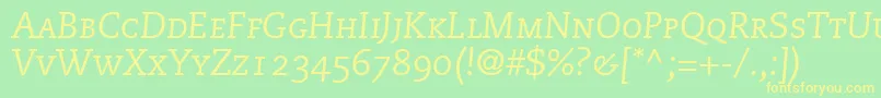 フォントMonologueCapsSsiItalicSmallCaps – 黄色の文字が緑の背景にあります