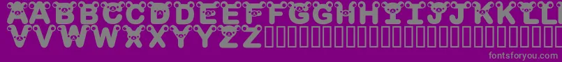 Fonte RilakkumadingbatBold – fontes cinzas em um fundo violeta