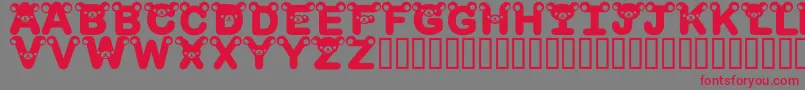 フォントRilakkumadingbatBold – 赤い文字の灰色の背景