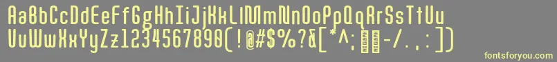 QuotaBoldcond. Font – Yellow Fonts on Gray Background