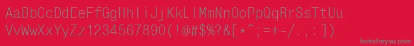 フォントUkrainianMonocondensed – 赤い背景に灰色の文字