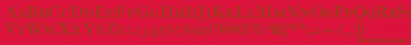 Czcionka OldStyle7SmallCapsOldStyleFigures – brązowe czcionki na czerwonym tle