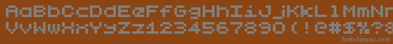 フォントLilliput – 茶色の背景に灰色の文字