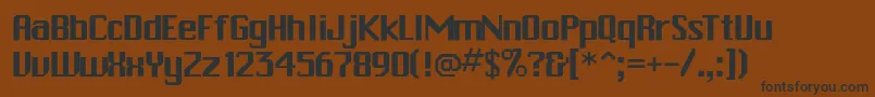 フォントPchickman – 黒い文字が茶色の背景にあります