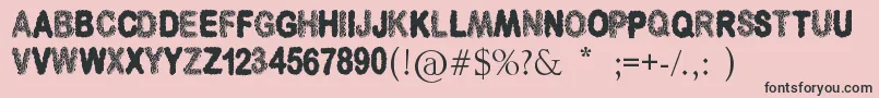フォント3DCubesSolid – ピンクの背景に黒い文字