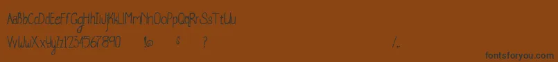 Czcionka WhaleWatching – czarne czcionki na brązowym tle