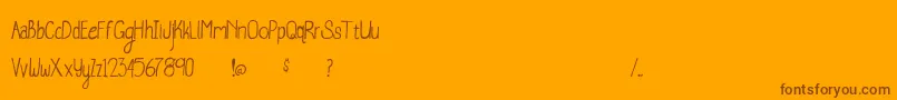 Czcionka WhaleWatching – brązowe czcionki na pomarańczowym tle