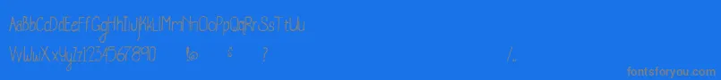 フォントWhaleWatching – 青い背景に灰色の文字