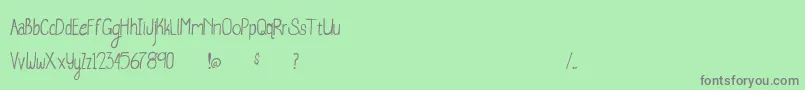 フォントWhaleWatching – 緑の背景に灰色の文字